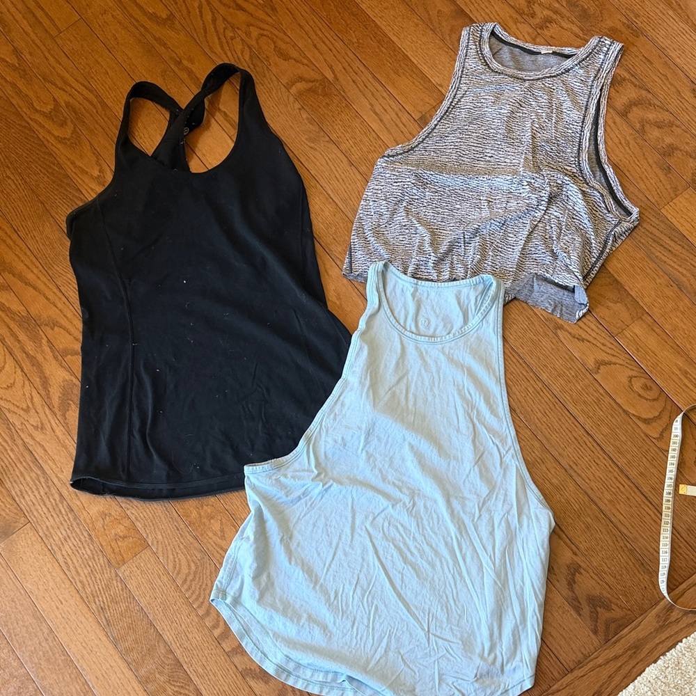 Bundle of 3 lululemon tank tops - black size 10, gray/white size 8, blue size 8